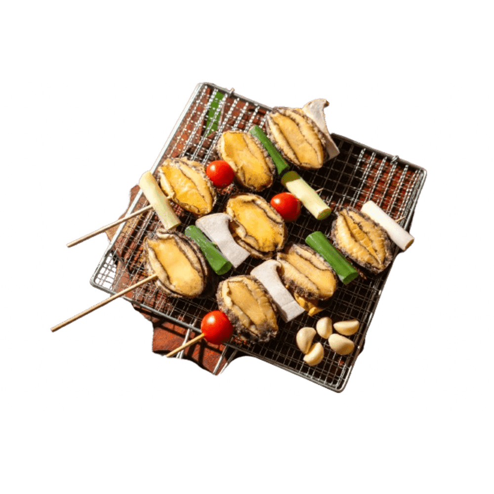 a bunch of food that is on a grill